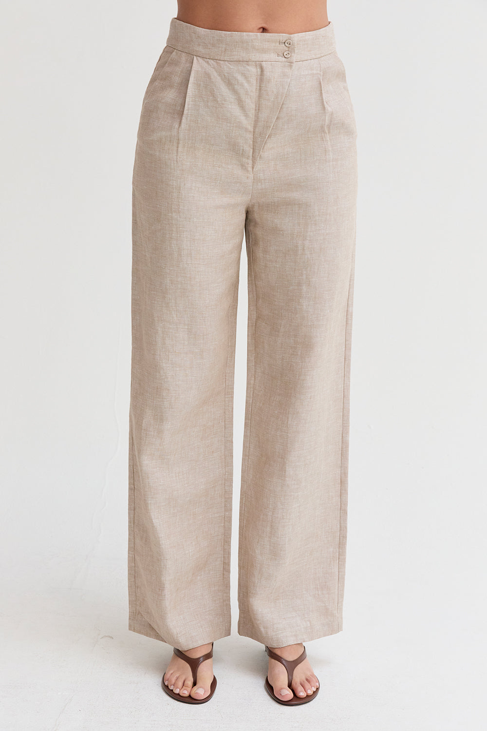 Pantalon large en lin pour femme avec plis sur le devant et poches latérales