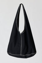 Sac à bandoulière hobo oversize en mélange de coton et de lin avec surpiqûres contrastantes