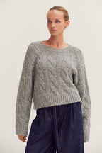 Pull en maille torsadée