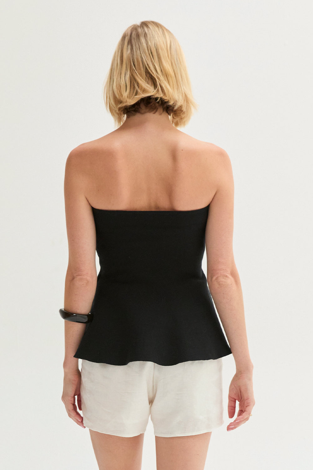 Haut tubulaire péplum en maille jacquard sans bretelles Coupe évasée